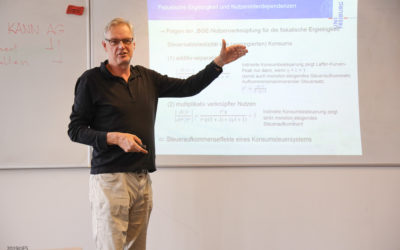 Lecture by Bernhard Neumärker on the Net Basic Income at the University of Gießen